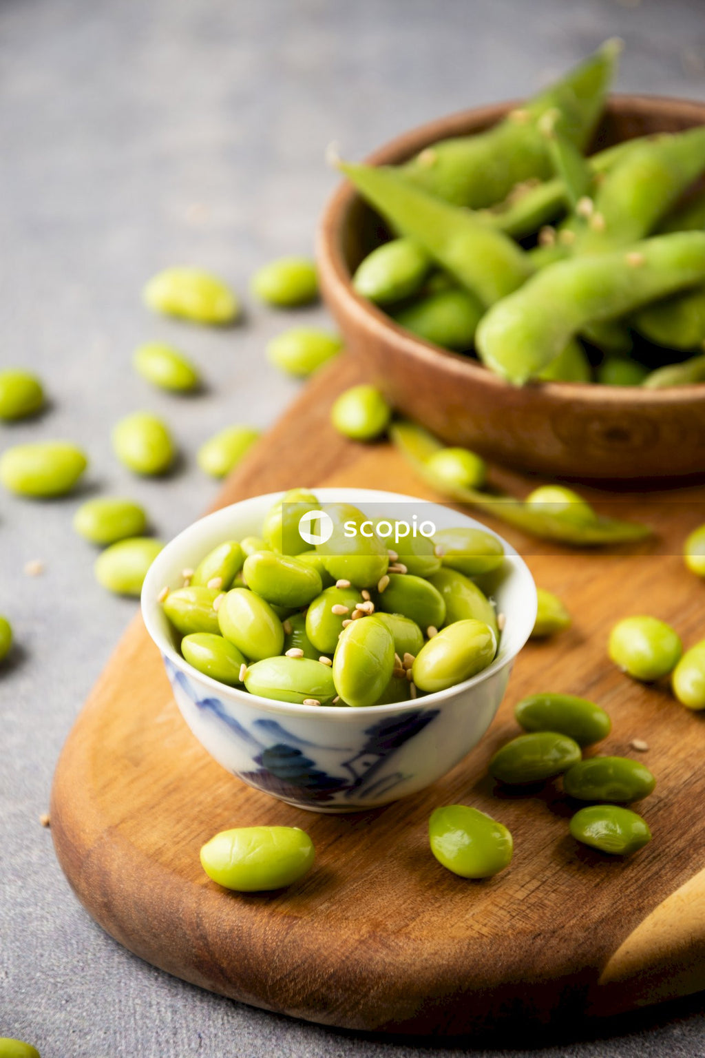 Green peas on white ceramic bowl