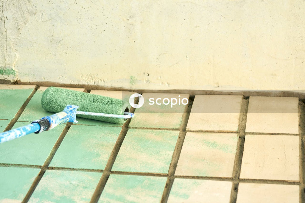 Green textile on brown concrete floor