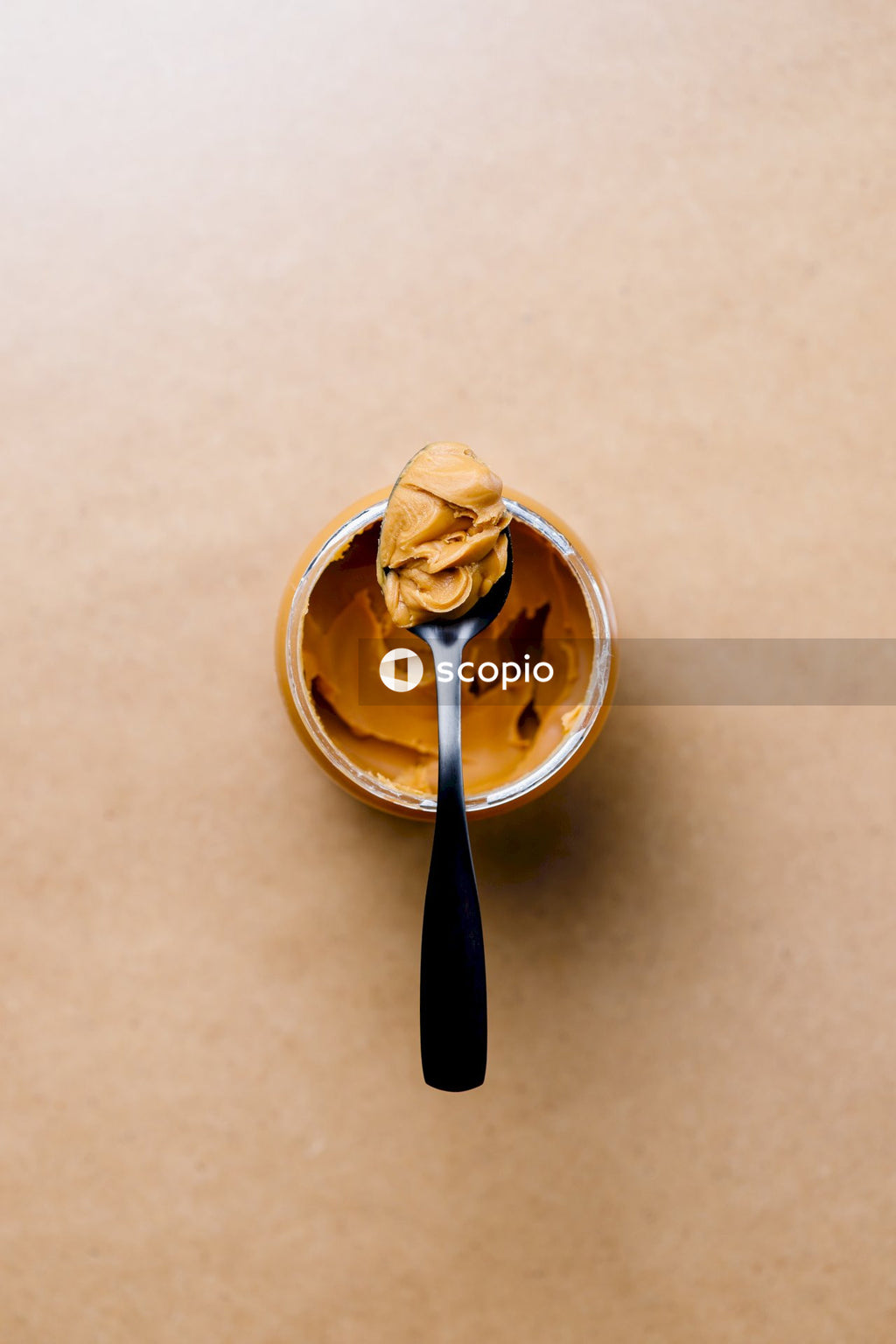 Ice cream in gold cup with spoon