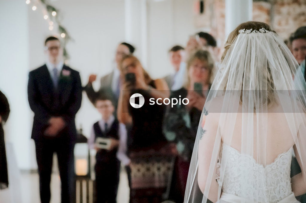 In focus bride walking towards out of focus groom