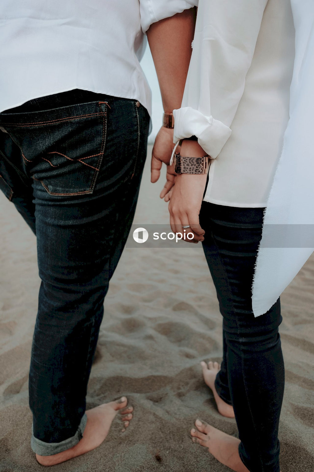 Man and woma standing beside eachother