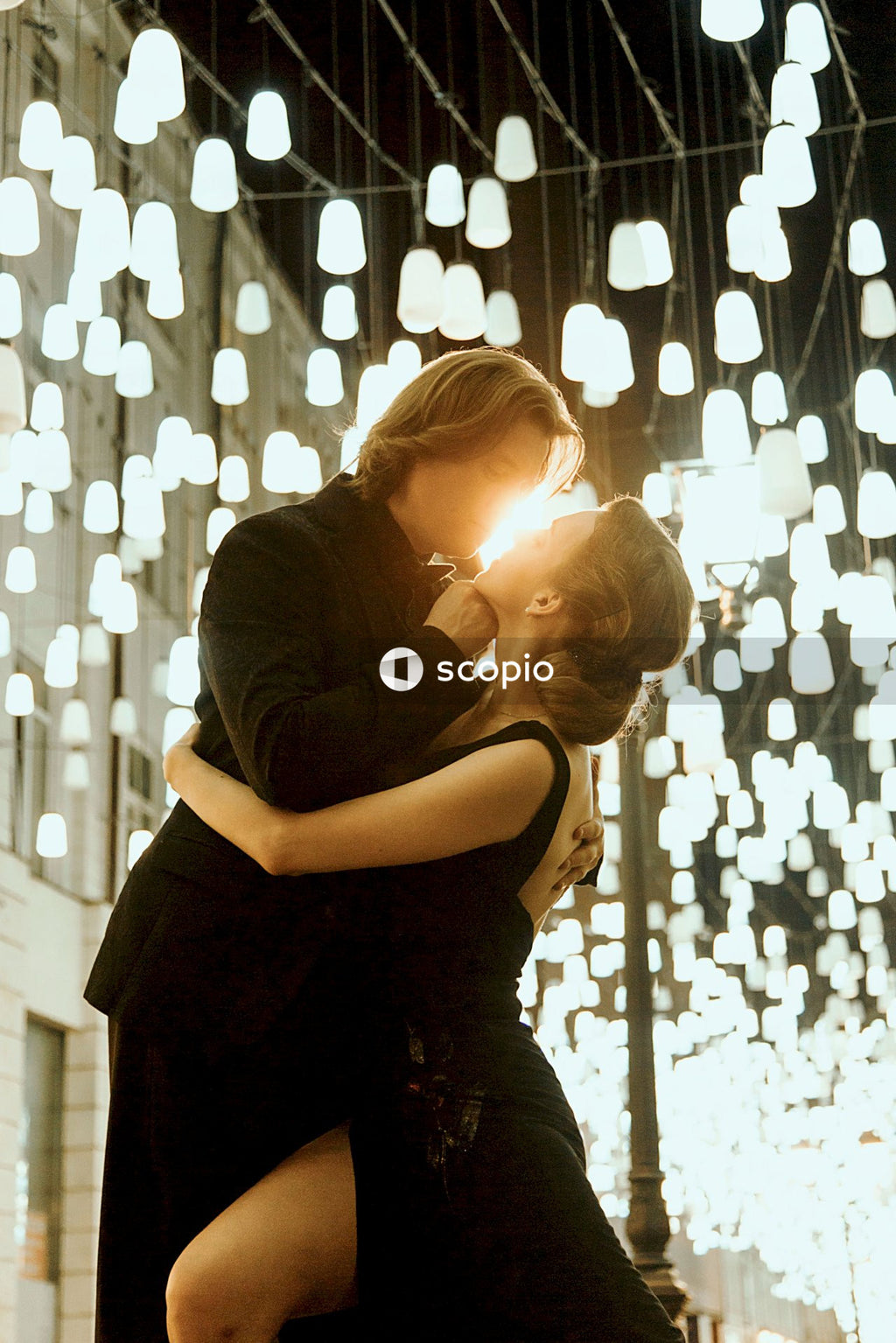 Man and woman about to kiss outdoor