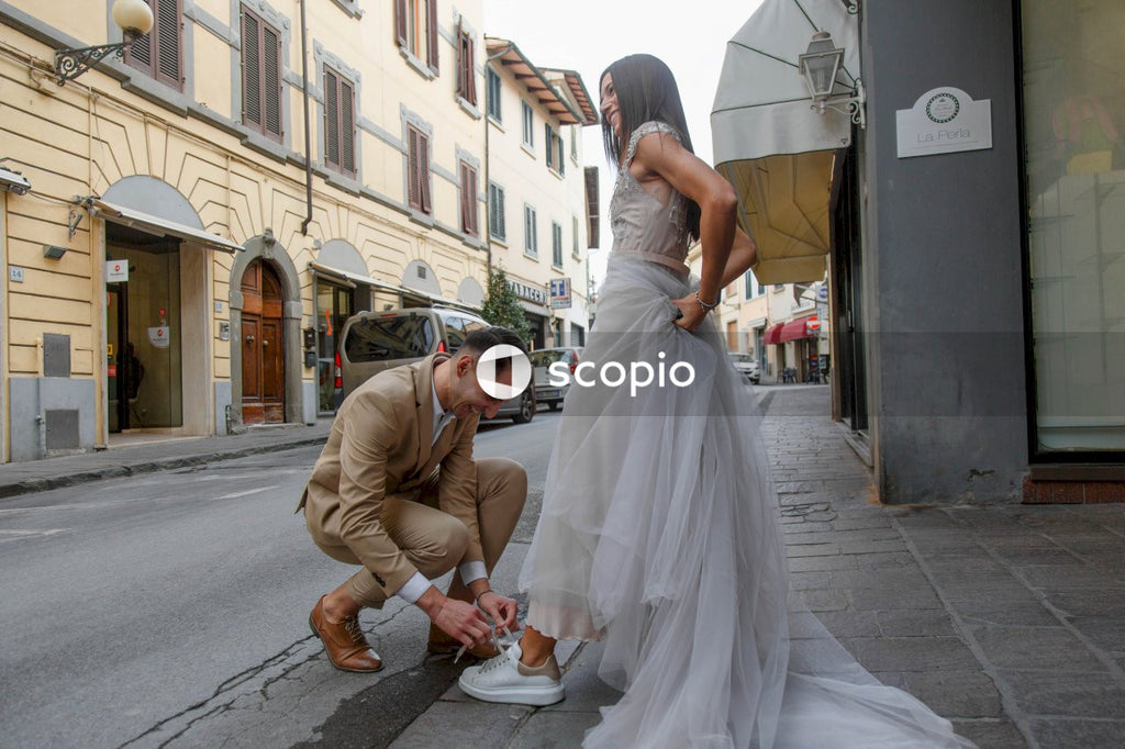 Young couple posing together on the streets in the city