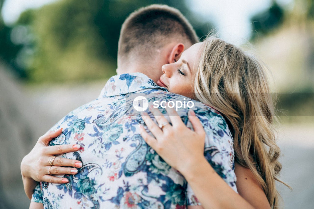 Man and woman hugging each other