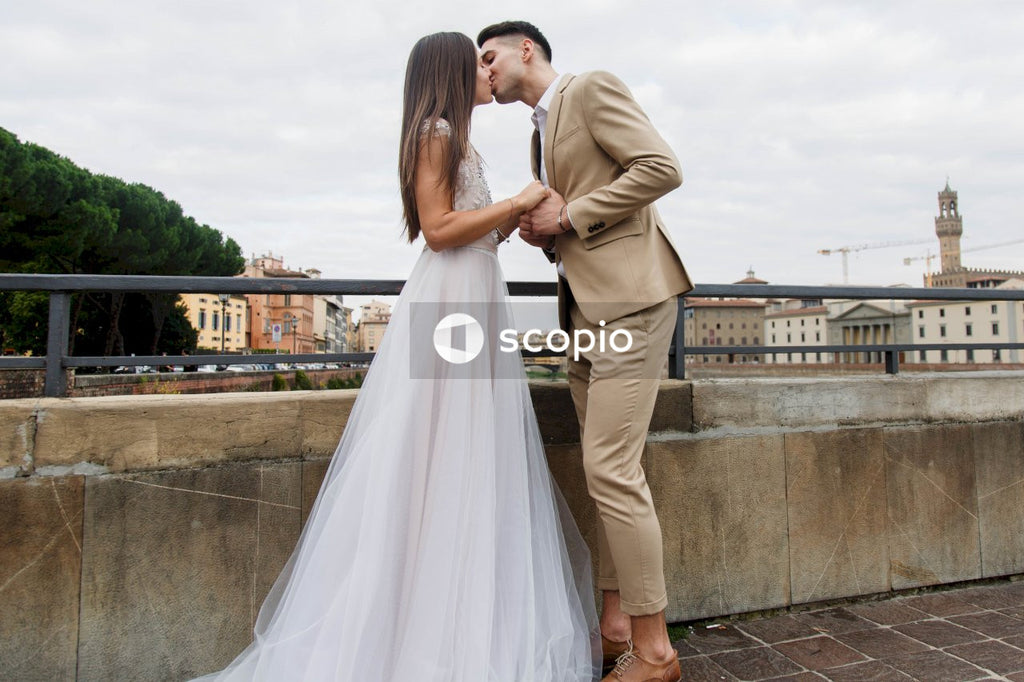 Young couple posing together on the streets in the city