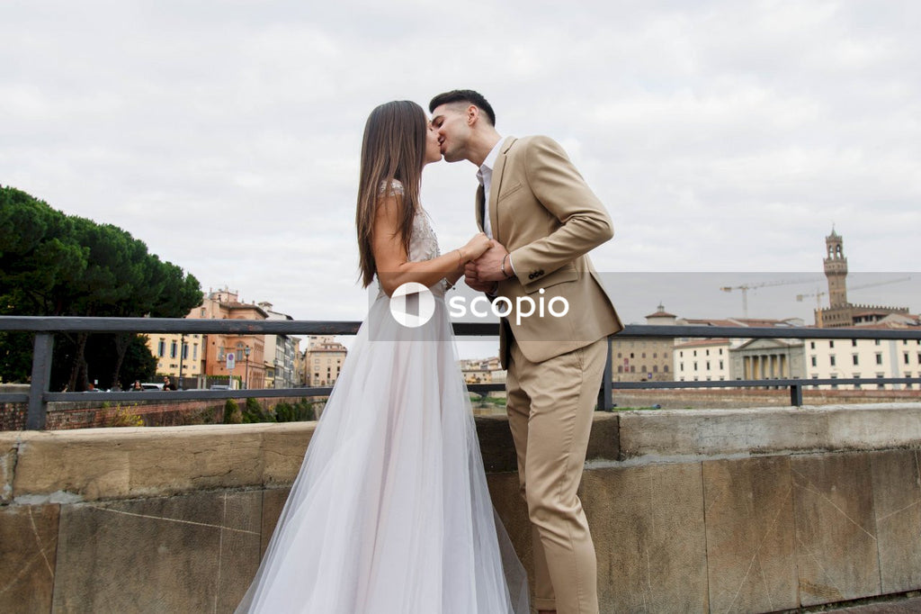 Young couple posing together on the streets in the city