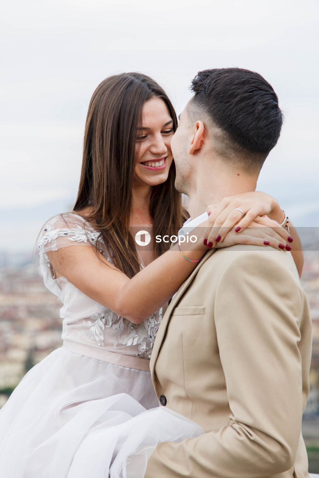 Young couple posing together on the streets in the city