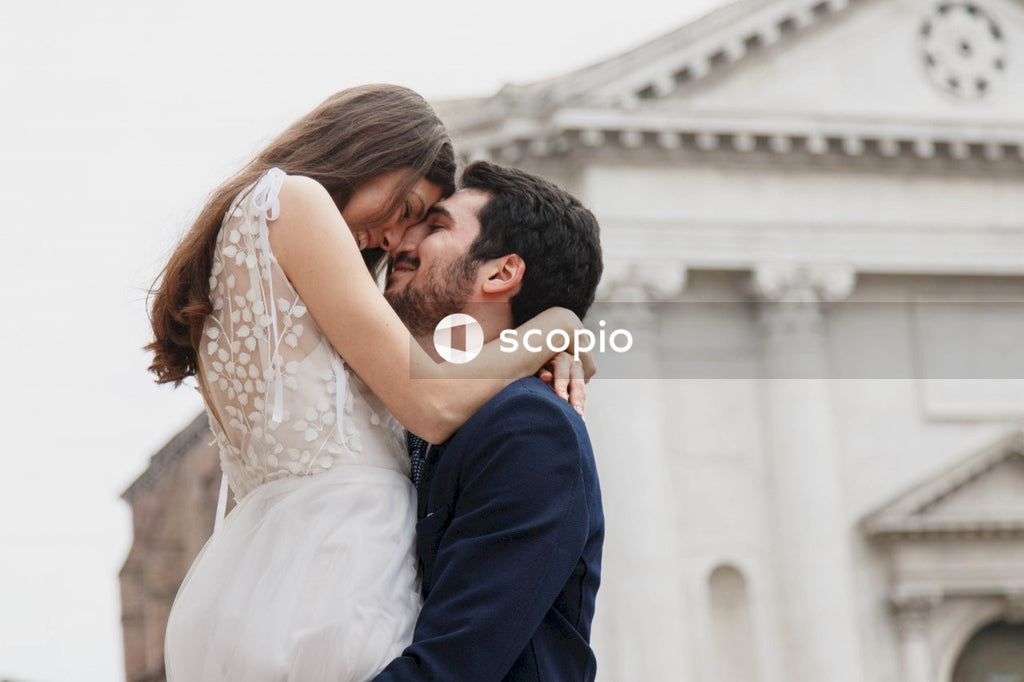 Young couple posing together on the streets in the city