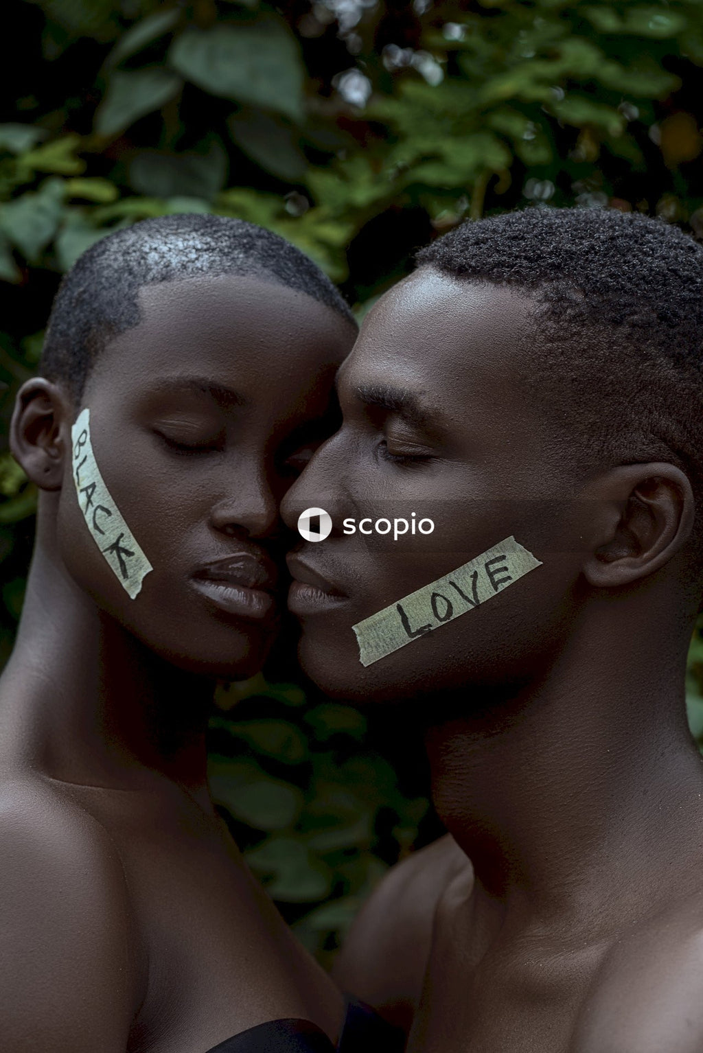 Black man and woman kissing each other