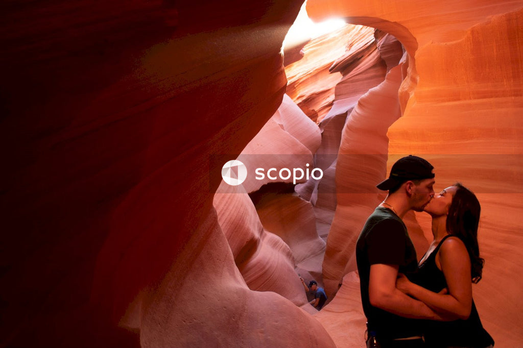 Man and woman kissing in Zion National Park
