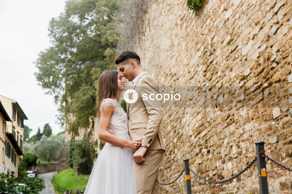 Young couple posing together on the streets in the city