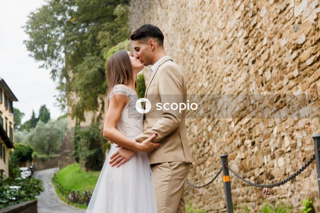 Young couple posing together on the streets in the city