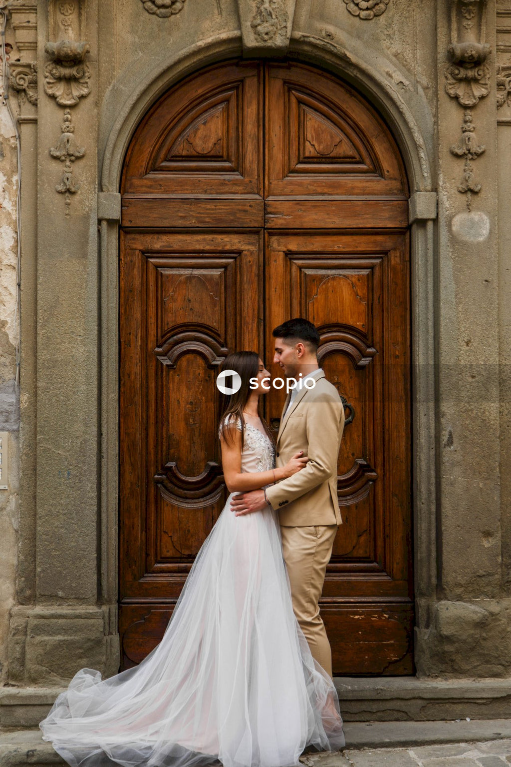 Young couple posing together on the streets in the city