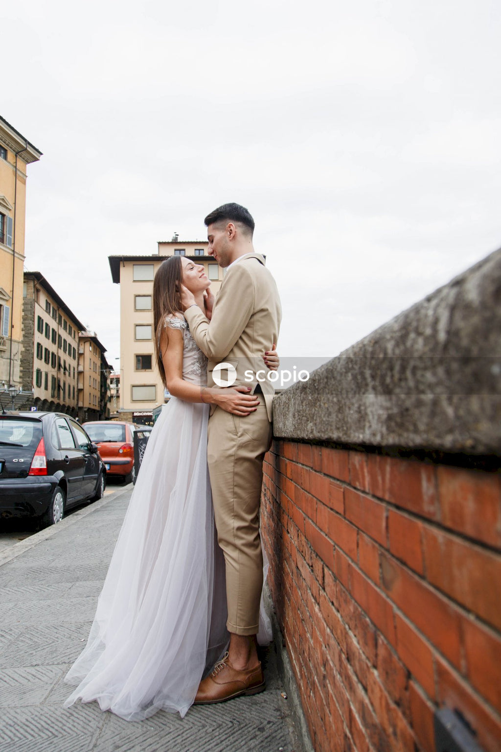 Young couple posing together on the streets in the city