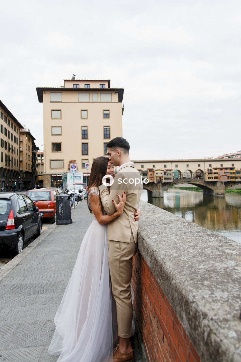 Young couple posing together on the streets in the city