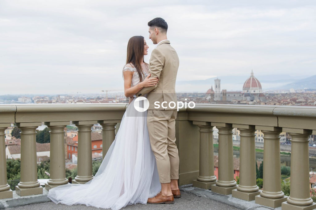 Young couple posing together on the streets in the city