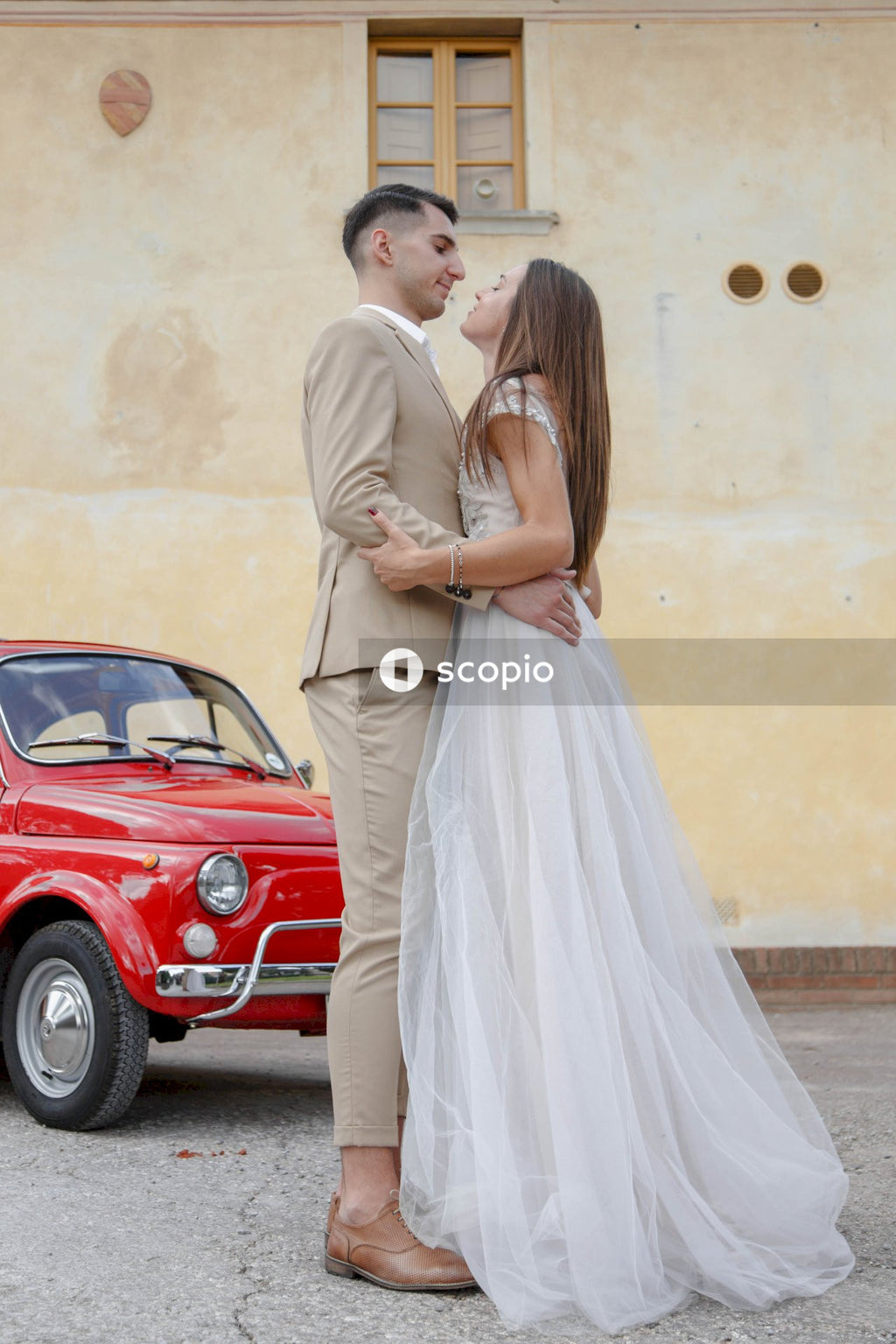 Young couple posing together on the streets in the city