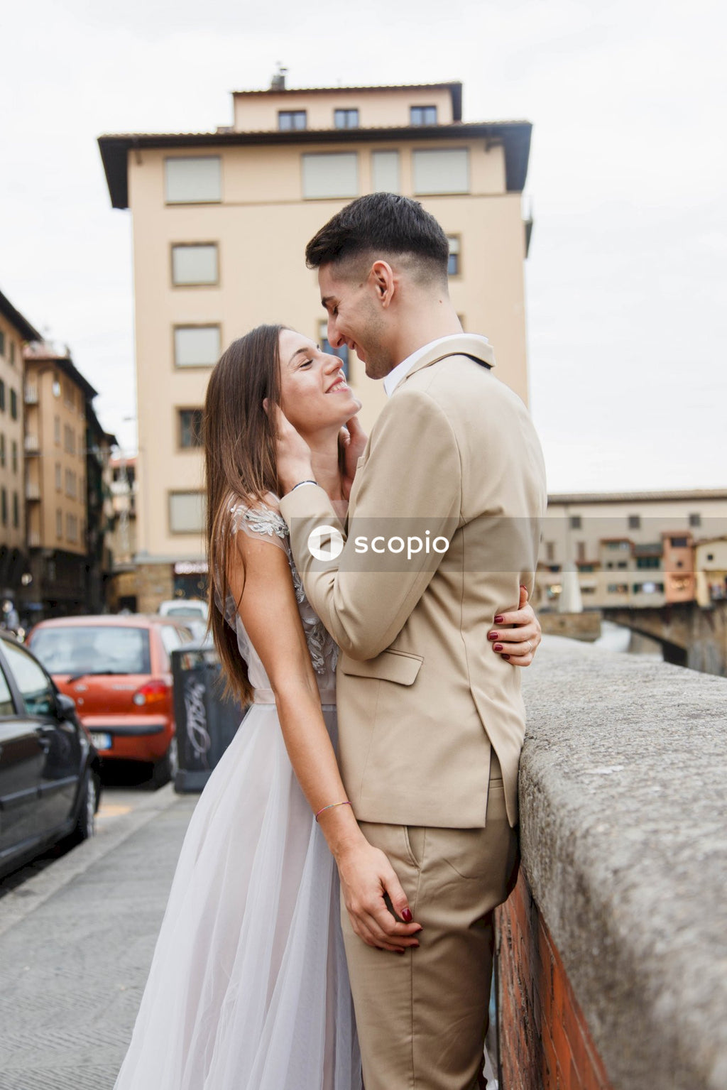 Young couple posing together on the streets in the city
