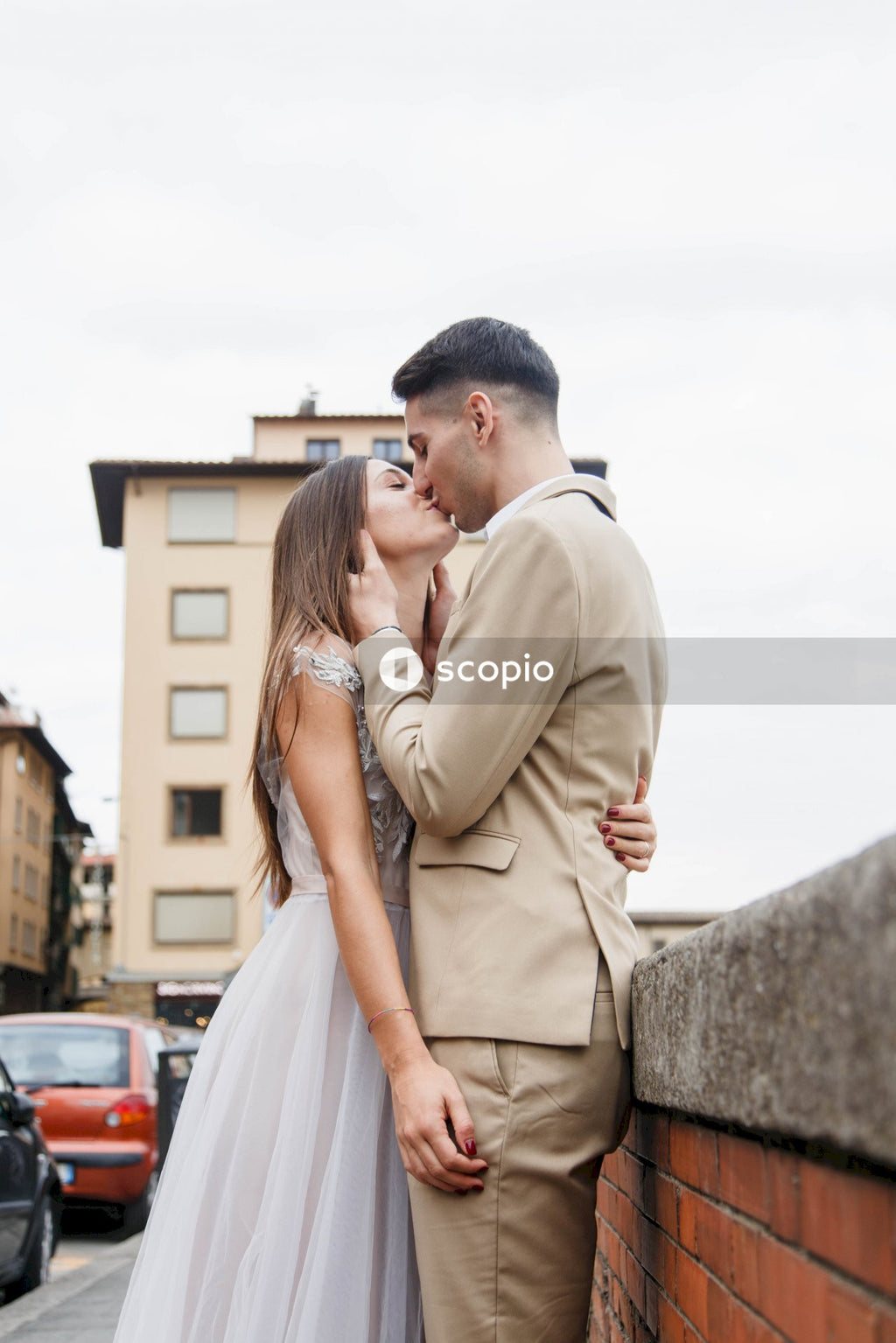 Young couple posing together on the streets in the city