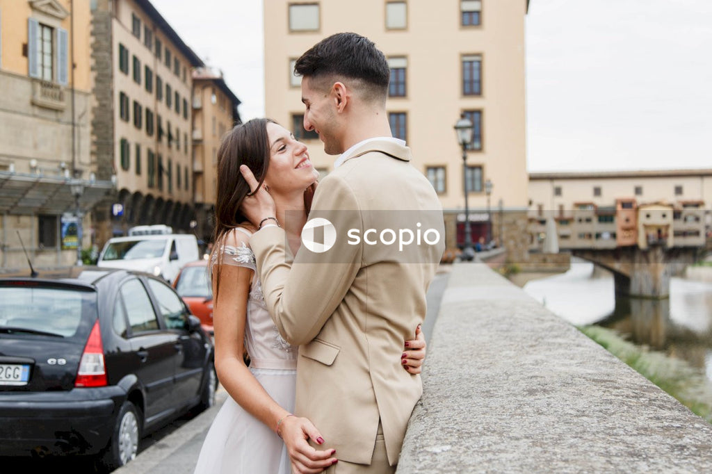 Young couple posing together on the streets in the city