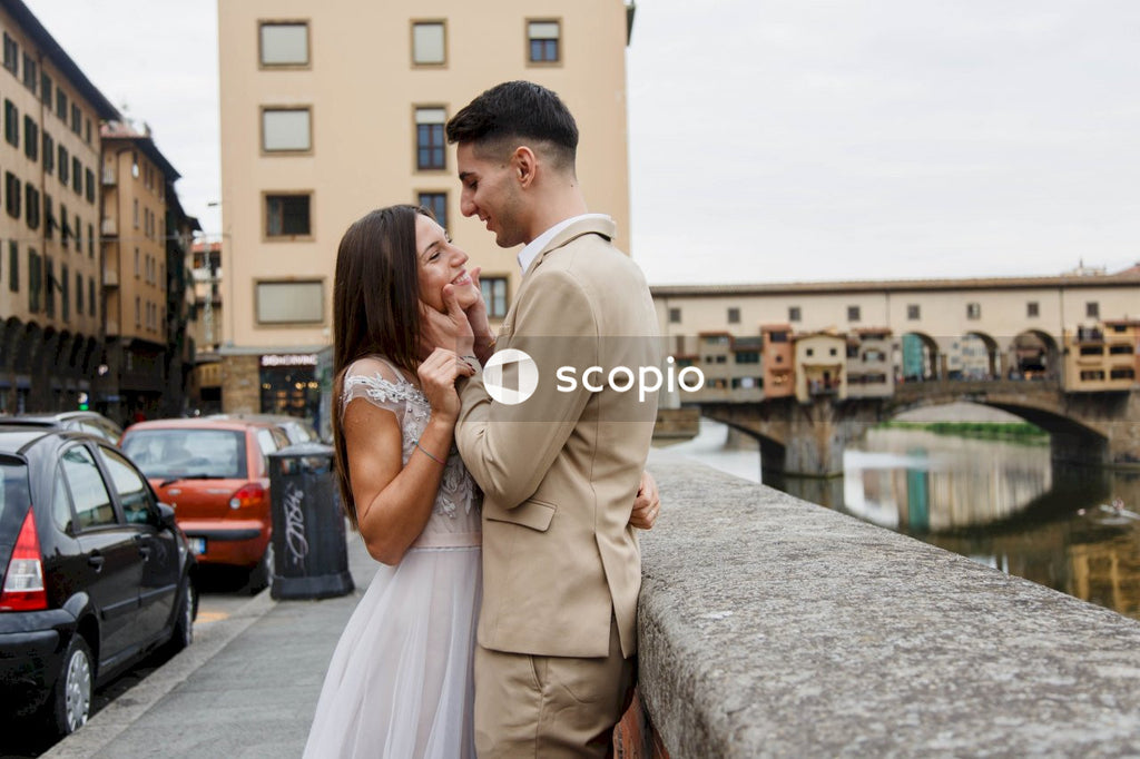 Young couple posing together on the streets in the city