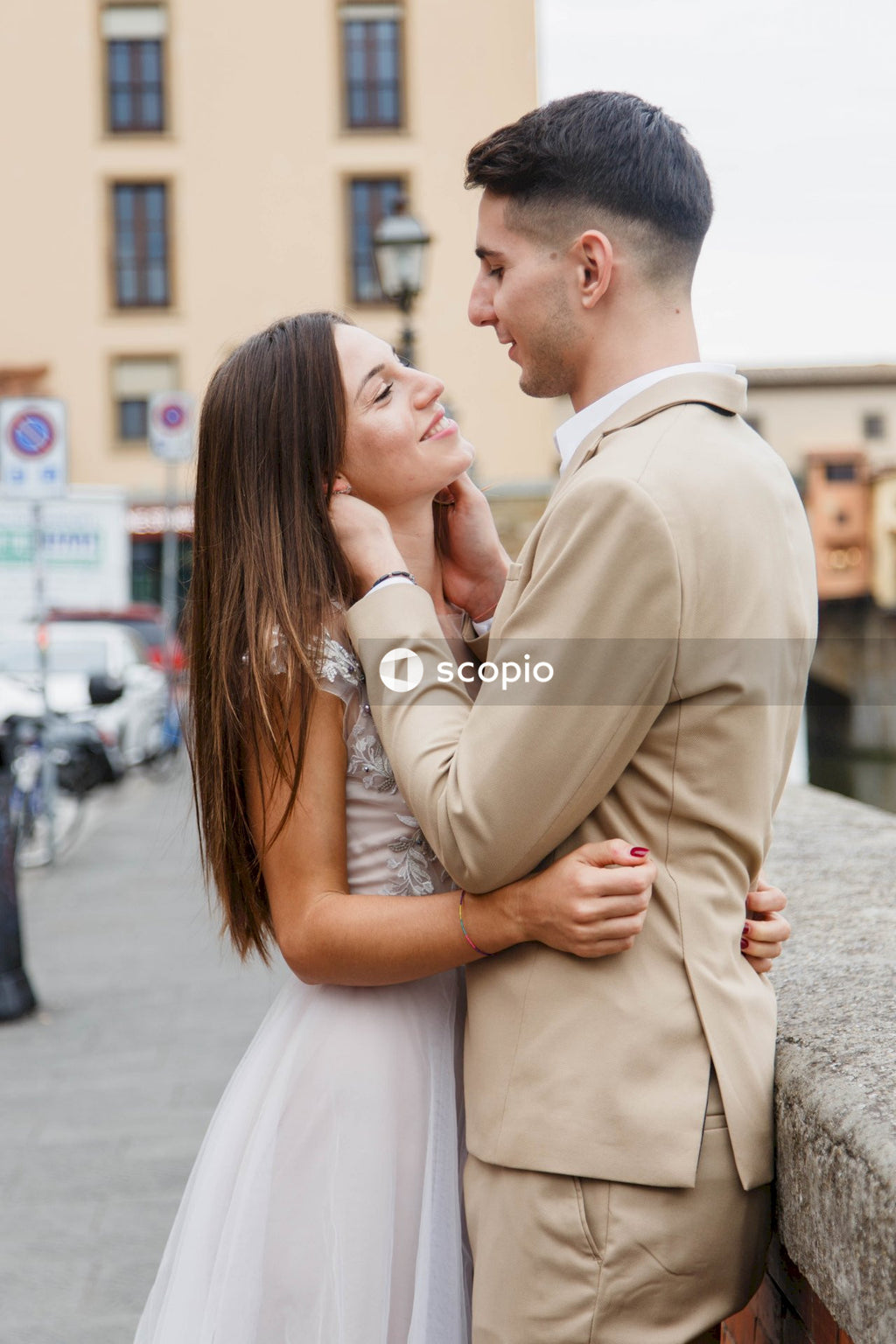 Young couple posing together on the streets in the city