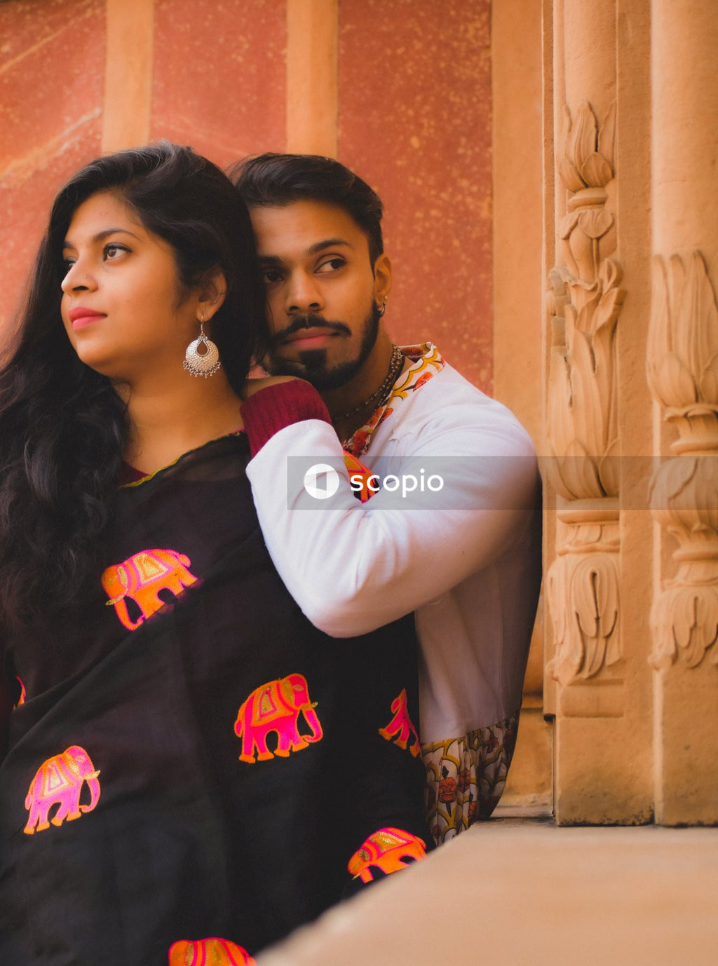 Man and woman leaning on each other outdoor