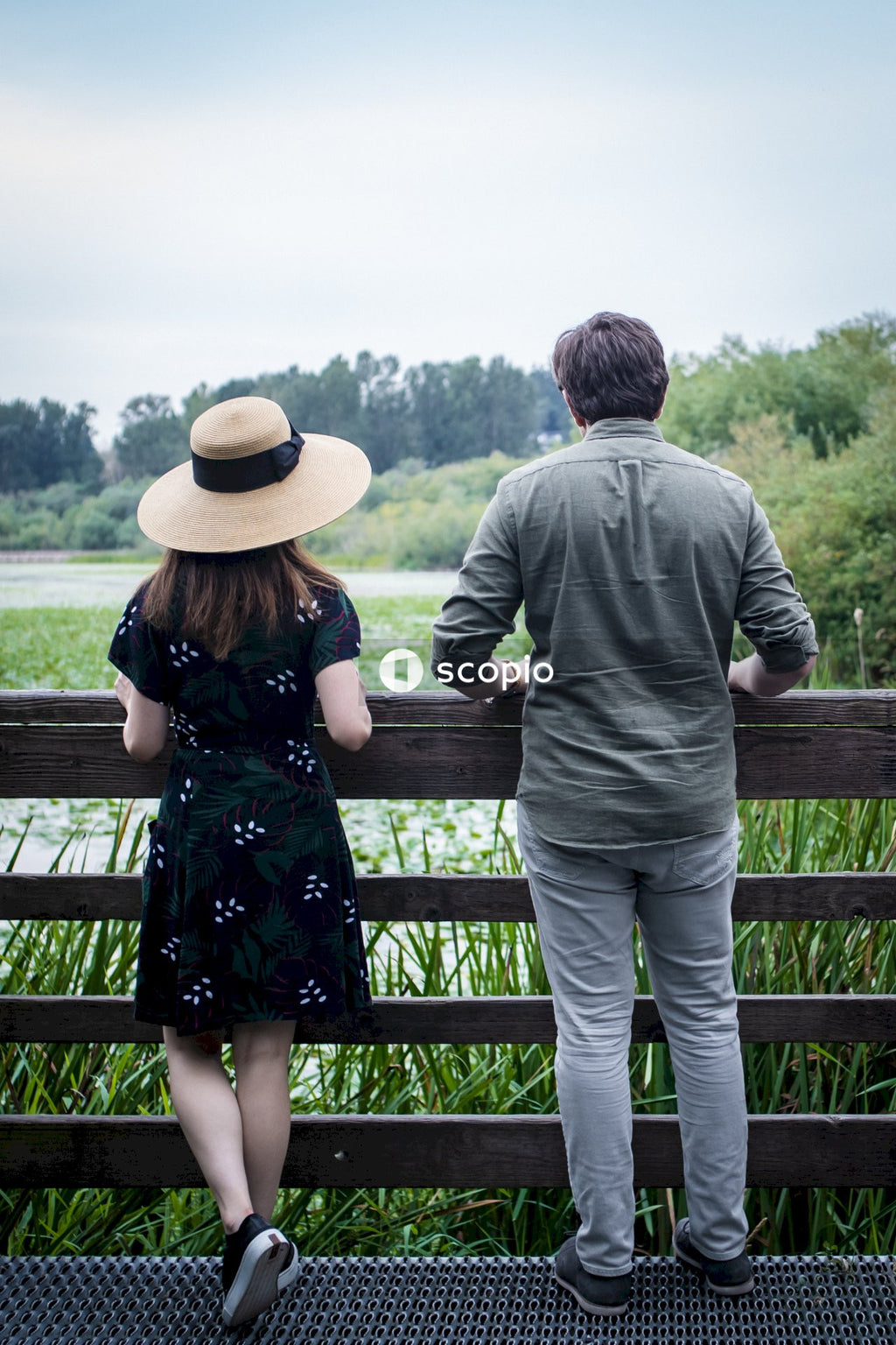 Man and woman overlooking a lake