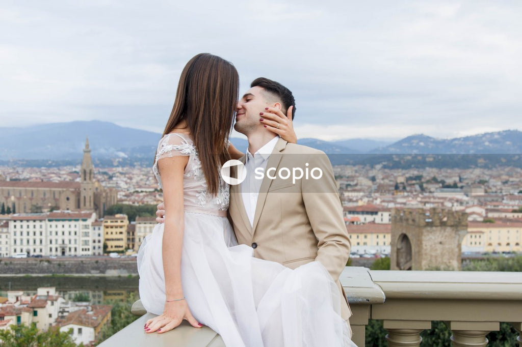 Young couple posing together on the streets in the city