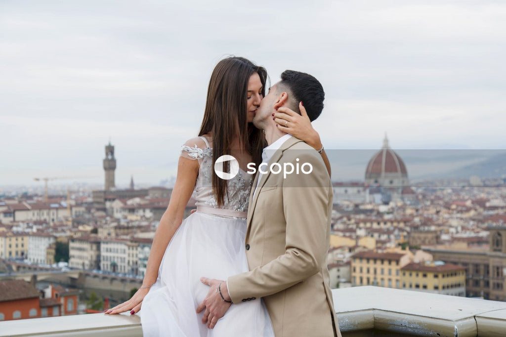 Young couple posing together on the streets in the city