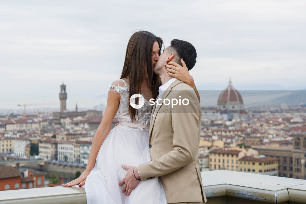 Young couple posing together on the streets in the city
