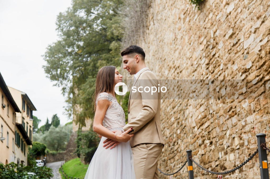 Young couple posing together on the streets in the city