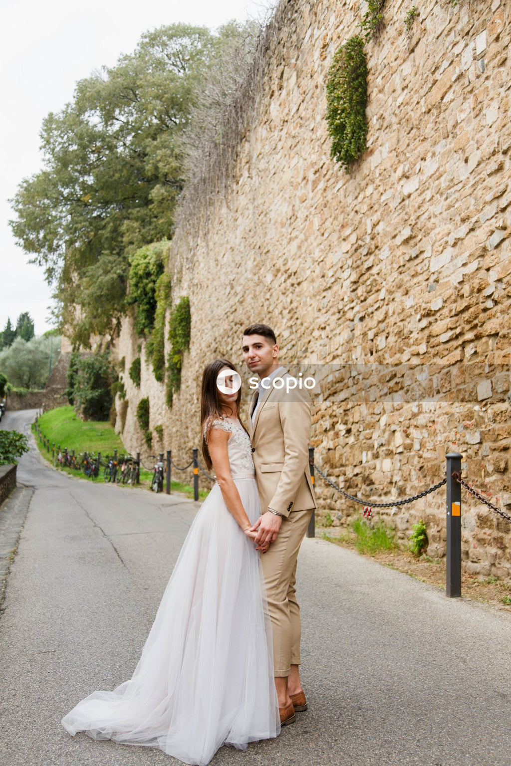Young couple posing together on the streets in the city