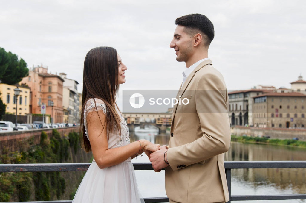 Young couple posing together on the streets in the city