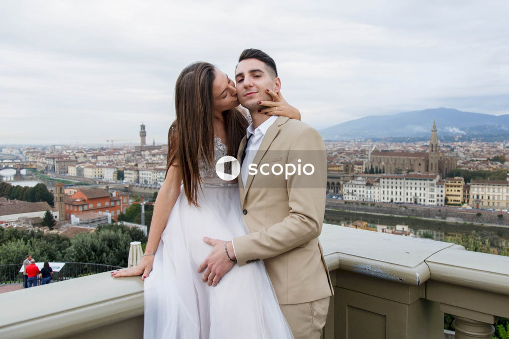 Young couple posing together on the streets in the city