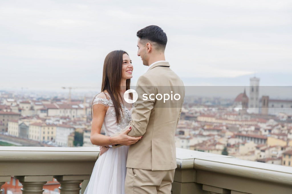 Young couple posing together on the streets in the city