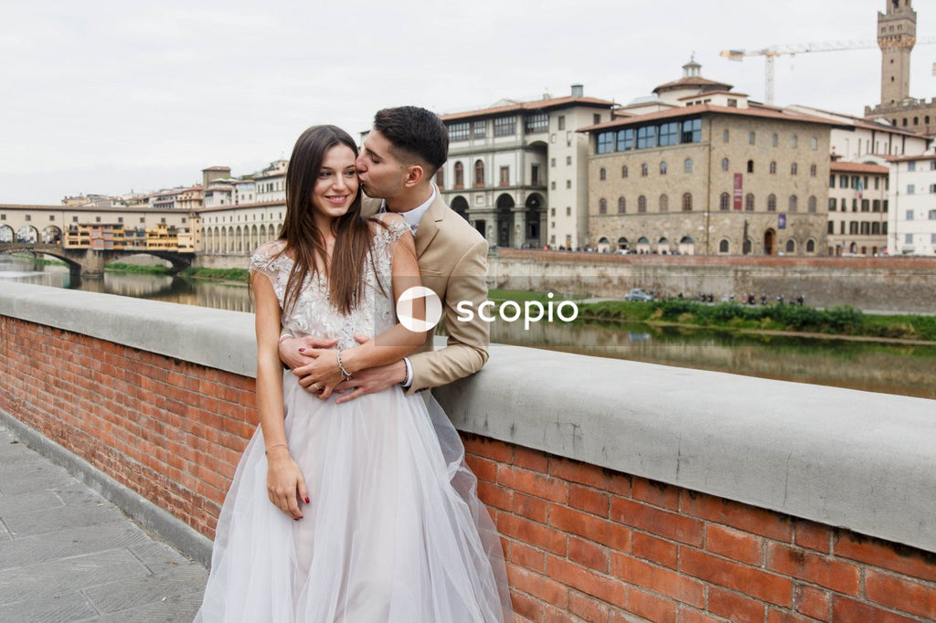 Young couple posing together on the streets in the city