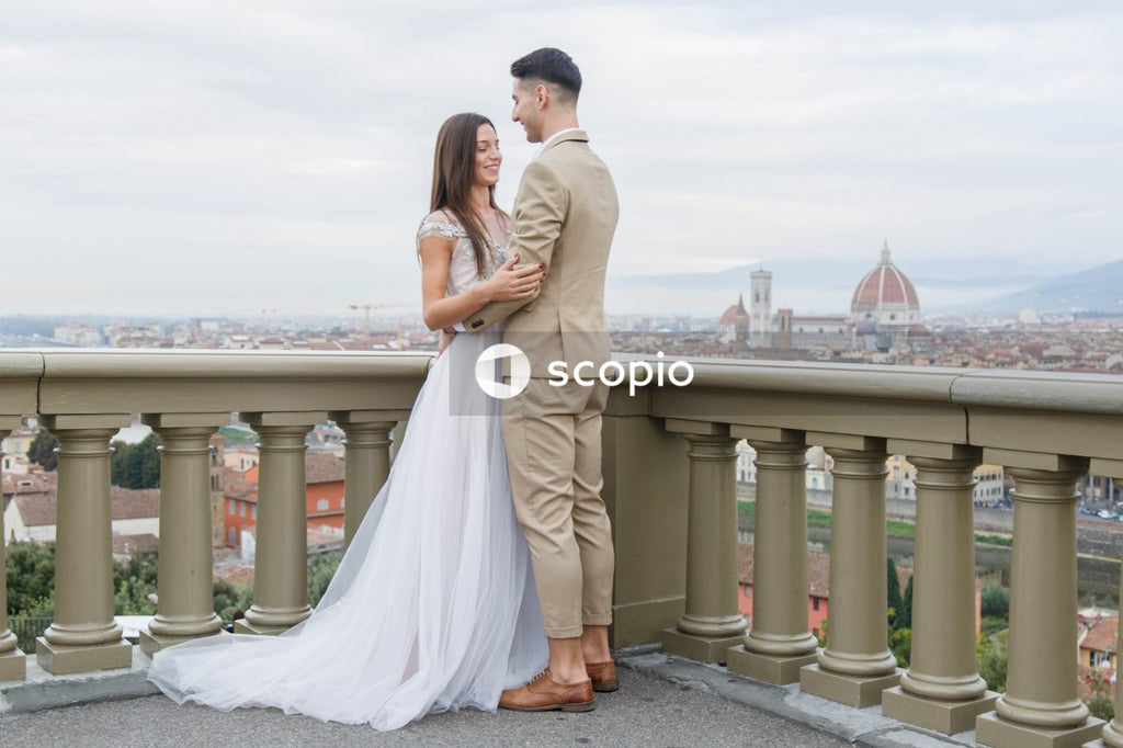 Young couple posing together on the streets in the city