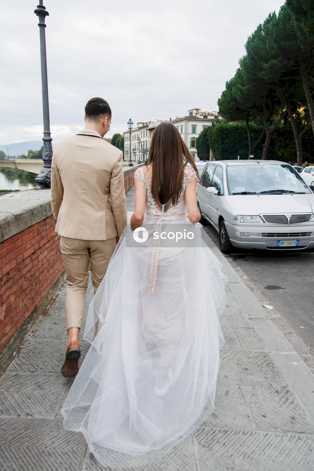 Young couple posing together on the streets in the city