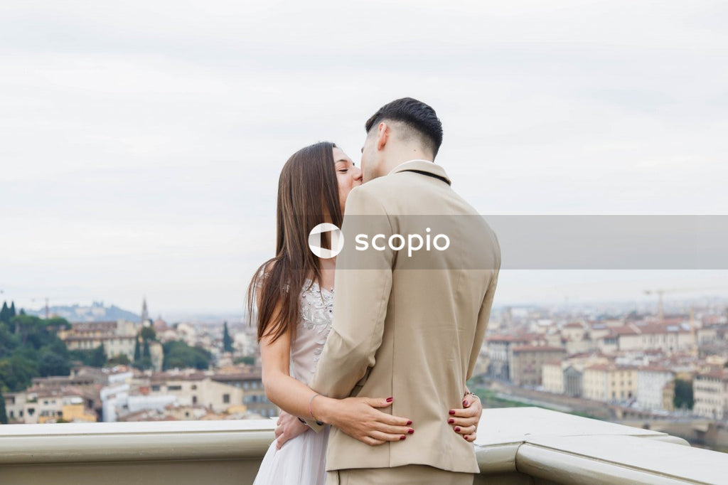 Young couple posing together on the streets in the city