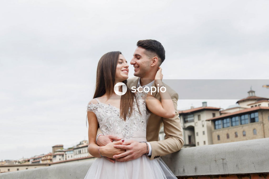 Young couple posing together on the streets in the city