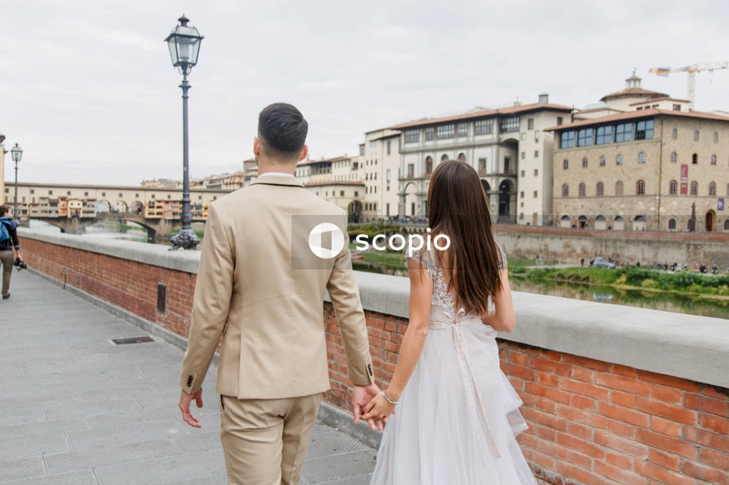 Young couple posing together on the streets in the city