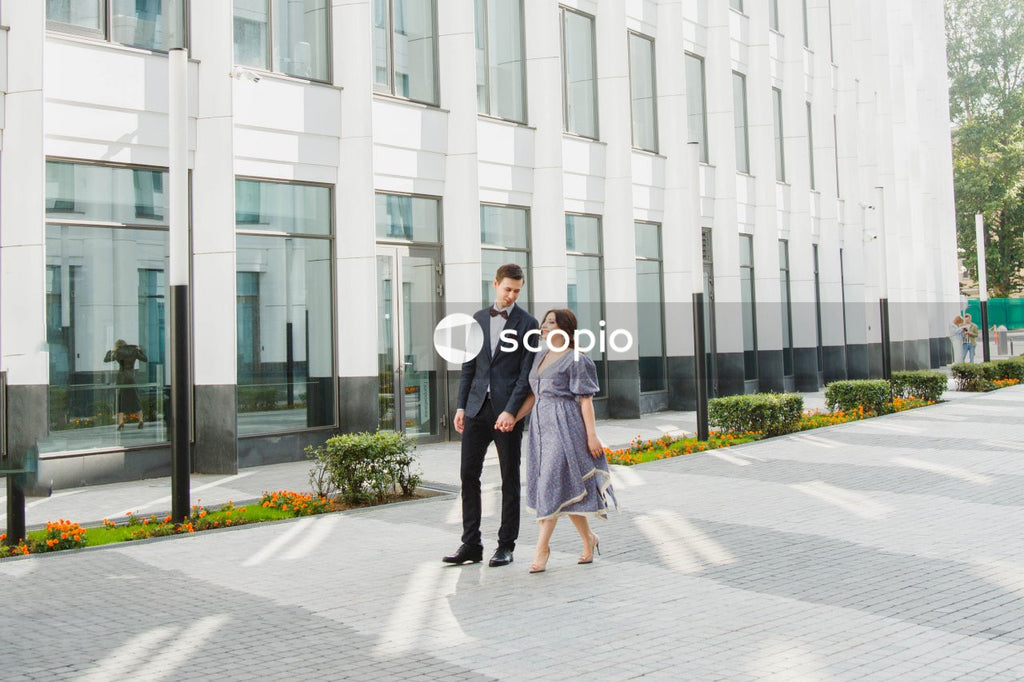 Young couple posing together on the streets in the city