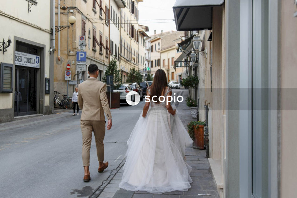 Young couple posing together on the streets in the city