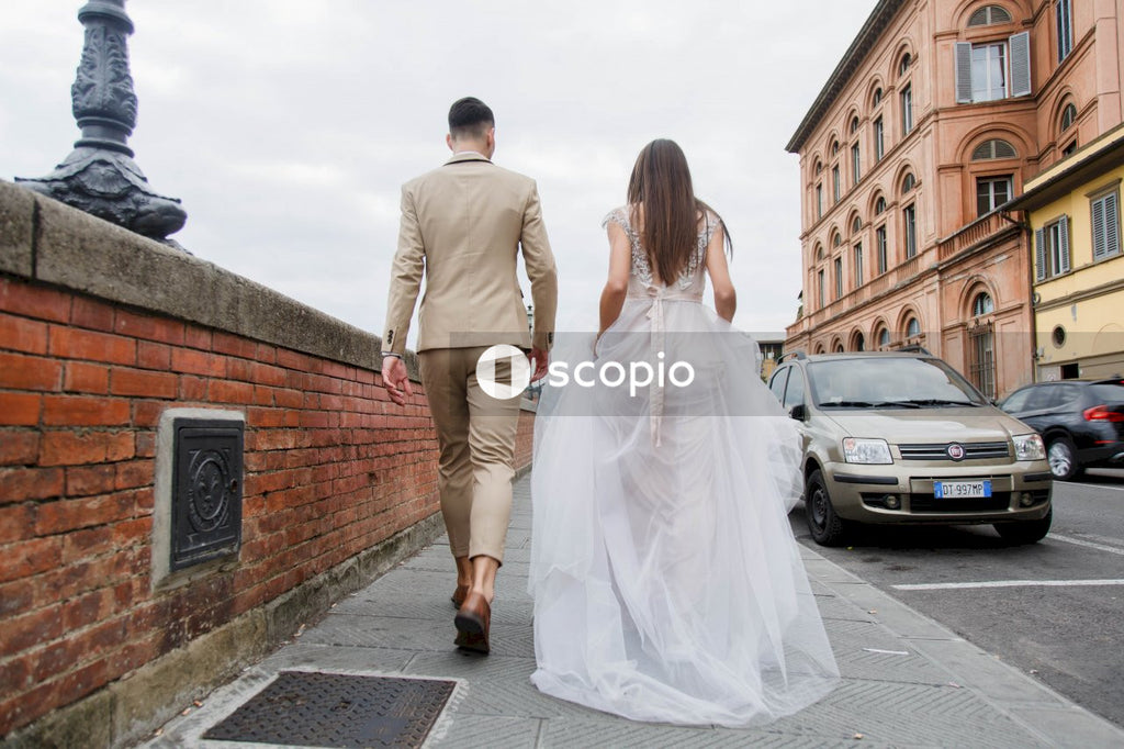 Young couple posing together on the streets in the city