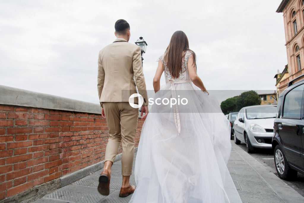Young couple posing together on the streets in the city