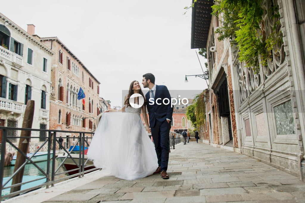 Young couple posing together on the streets in the city