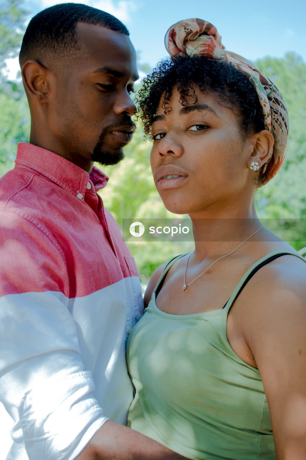 Black couple hugging outdoor