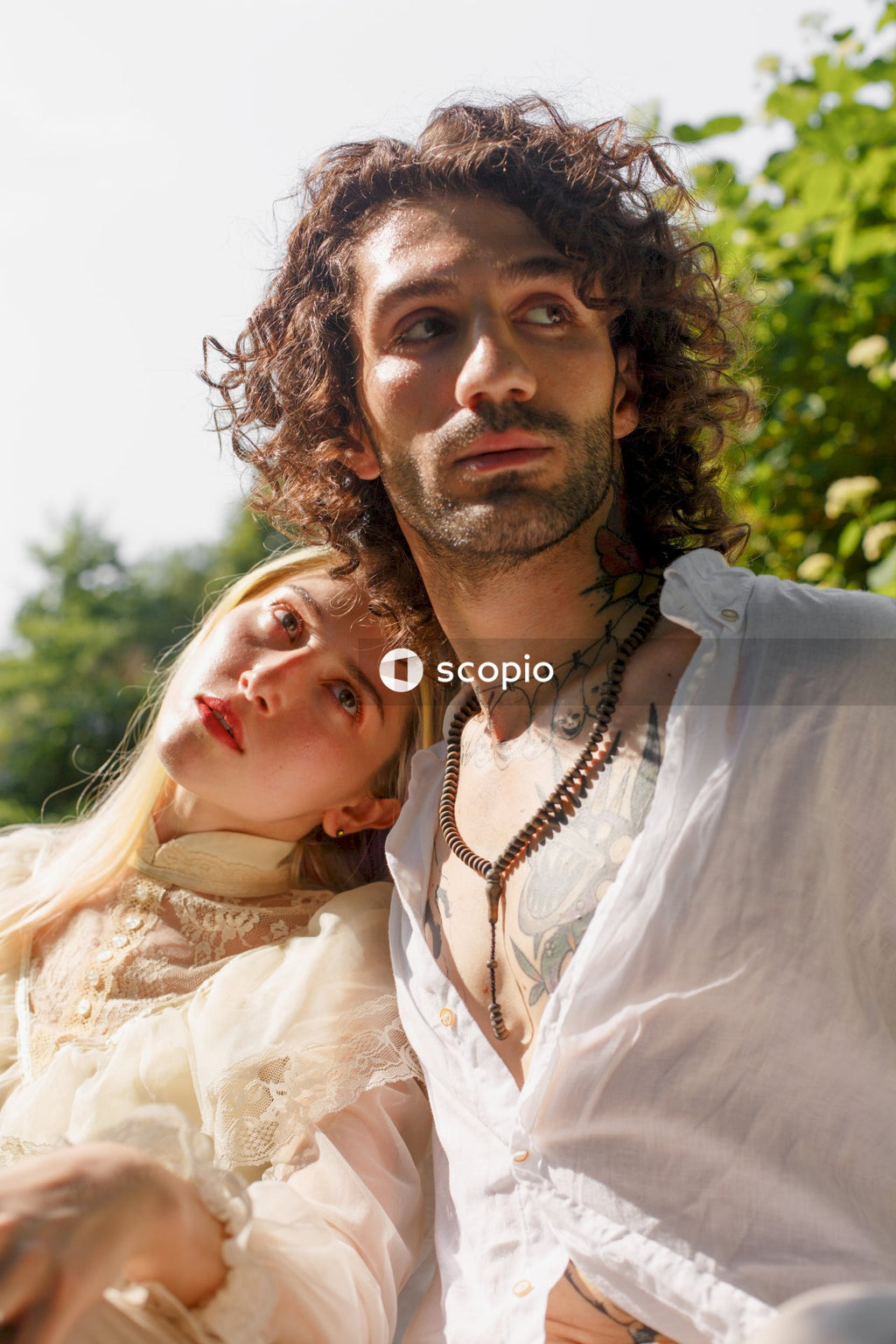 Woman leaning her head on man