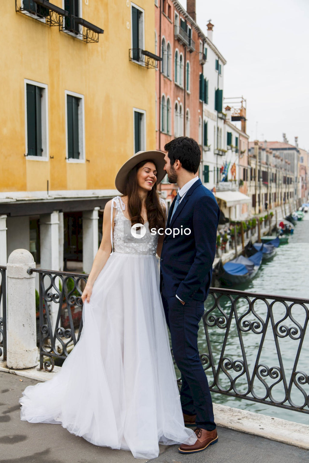Bride and groom posing in the outdoors of Venice, Italy